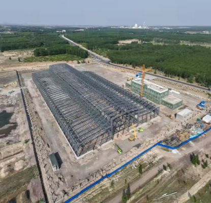 Prefabricated bolt‑assembled steel‑frame building industrial workshop logistics warehouse plant with crane beam mezzanine floor skylight and drainage system for industrial construction