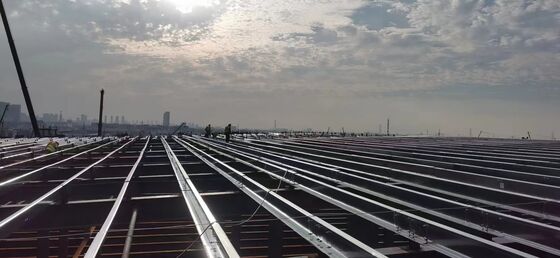 Steel purlin and column framework building customizable layout heavy‑duty crane base suitable for manufacturing workshop raw‑material warehouse