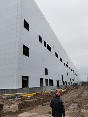 Pre‑manufactured steel frame components field installation factory building food‑processing plant stock warehouse transit logistics station